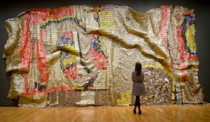 El Anatsui (Ghanaian, b. 1944). Earth’s Skin, 2007. Aluminum and copper wire, 177 x 394 in. (449.6 x 1000.8 cm). Courtesy of the artist and Jack Shainman Gallery, New York. Photo by Joe Levack, Courtesy of the Akron Art Museum